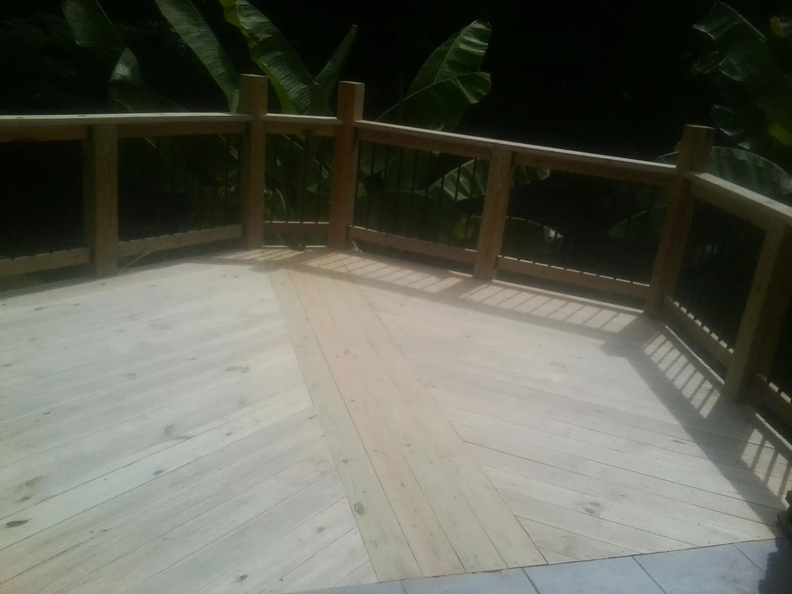 New wood deck and railing built off the back of a home in Gwynedd Valley