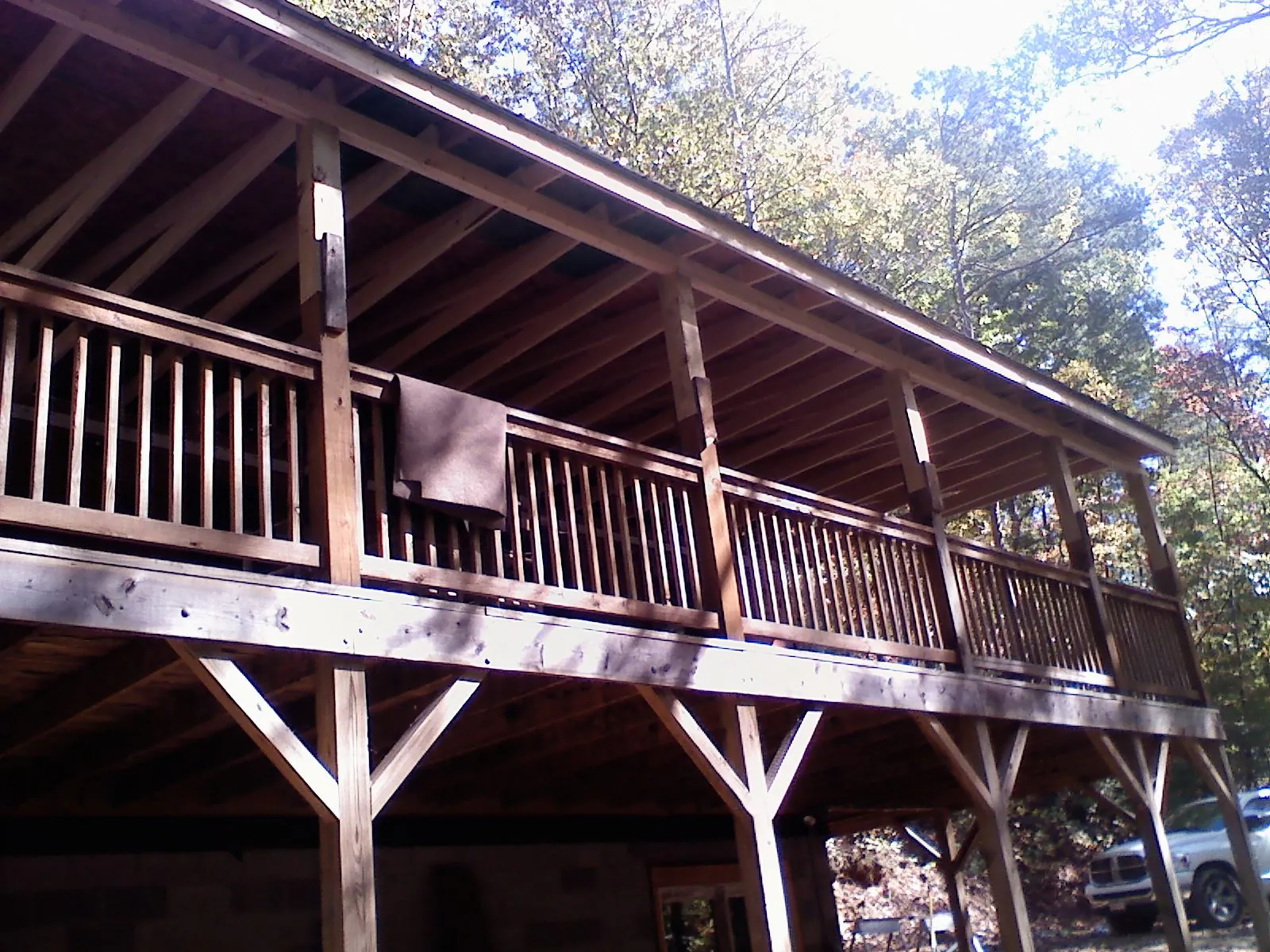 Timber framing under a new elevated porch and deck — Roof Leak Repair in Gwynedd Valley by Roofing Brothers